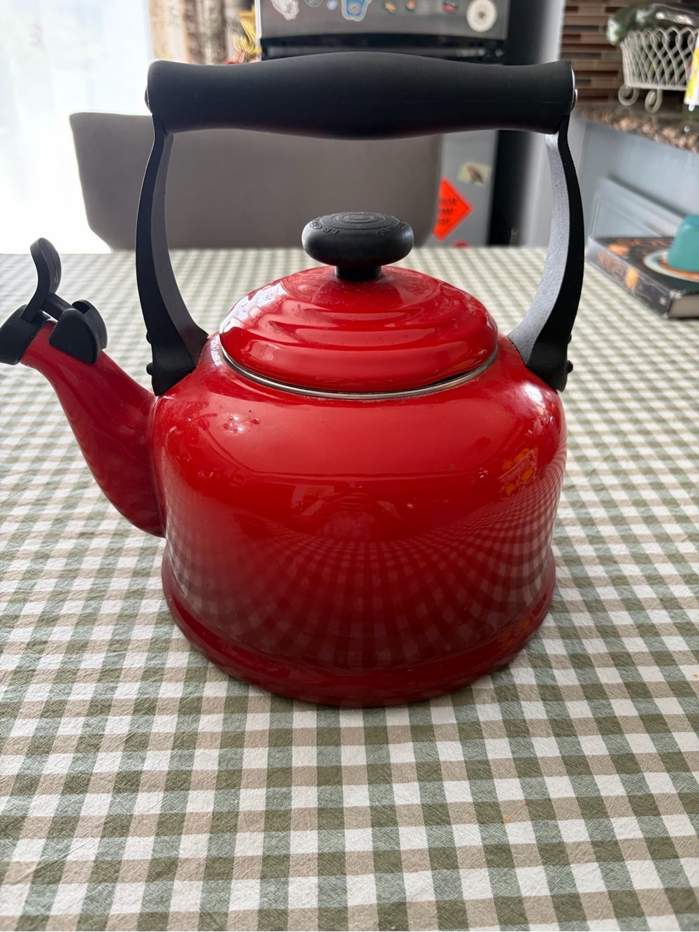 Le Creuset Red Whistling Tea Kettle with Black Handle